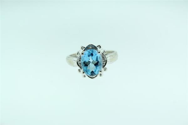 Blue Topaz Lady’s Stone & Diamond Ring 4 Diamonds .04 Carat T.W. 14K White Gold