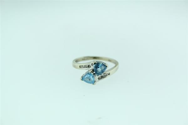 Blue Topaz Lady’s Stone & Diamond Ring 6 Diamonds .12 Carat T.W. 14K White Gold