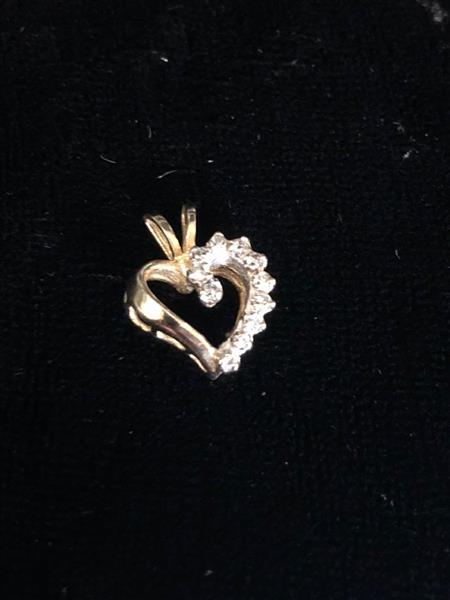 11 Diamonds .11 Carat T.W. 10K Yellow Gold 1.1g