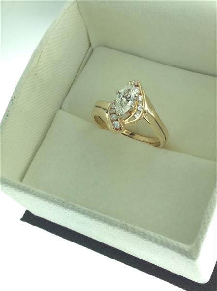 Lady’s Diamond Fashion Ring 11 Diamonds .65 Carat T.W. 14K Yellow Gold 3.5g
