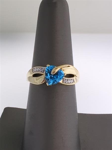 Blue Topaz Lady’s Stone & Diamond Ring 2 Diamonds .02 Carat T.W.