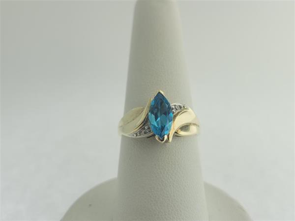 Blue Topaz Lady’s Stone & Diamond Ring 2 Diamonds .02 Carat T.W.