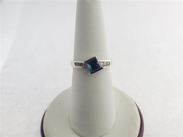 Blue Stone Lady’s Stone & Diamond Ring 8 Diamonds .40 Carat T.W. 14K White Gold