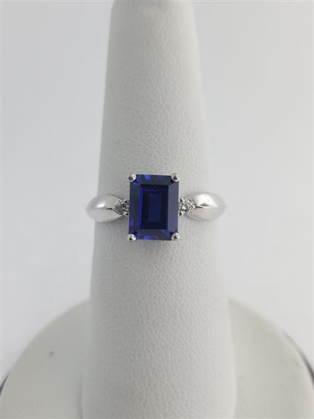 Blue Stone Lady’s Stone & Diamond Ring 2 Diamonds .06 Carat T.W. 14K White Gold